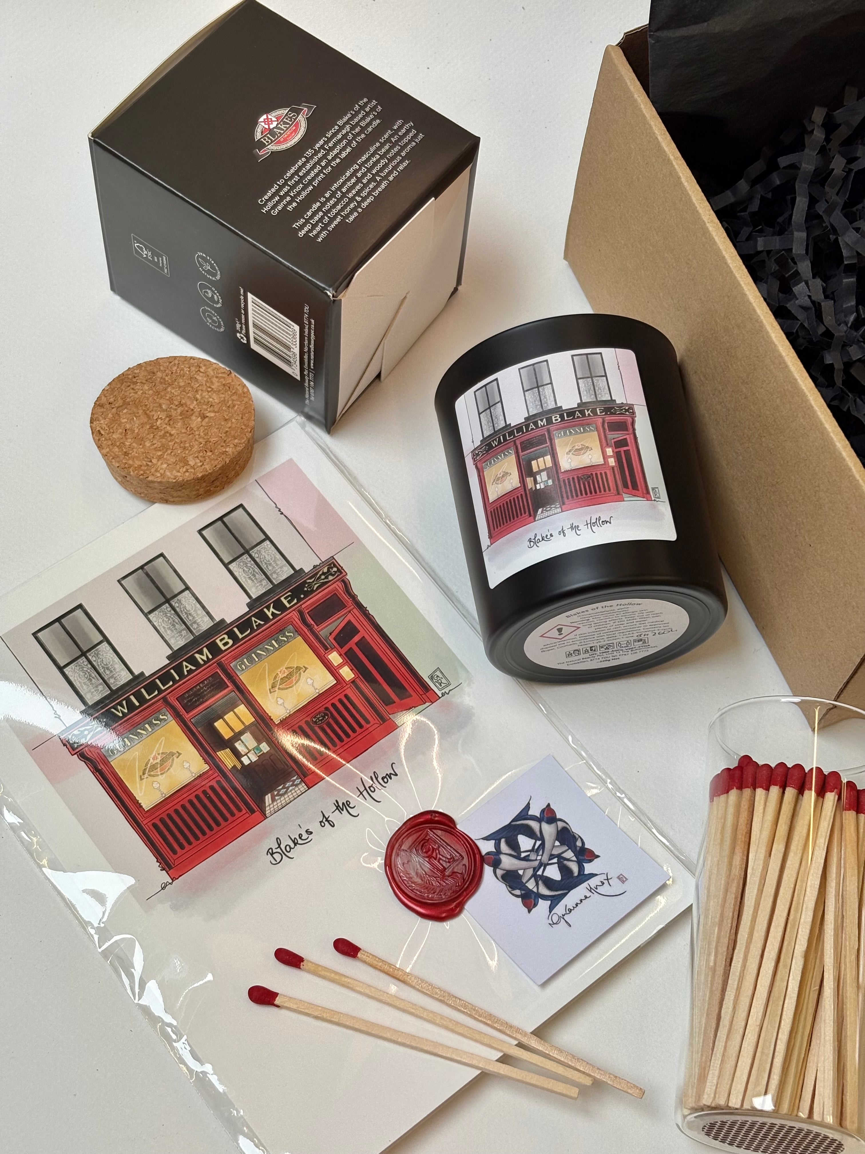 Blakes of the Hollow Enniskillen print by Grainne Know, candle by the Natural Beauty Pot, red tipped matches