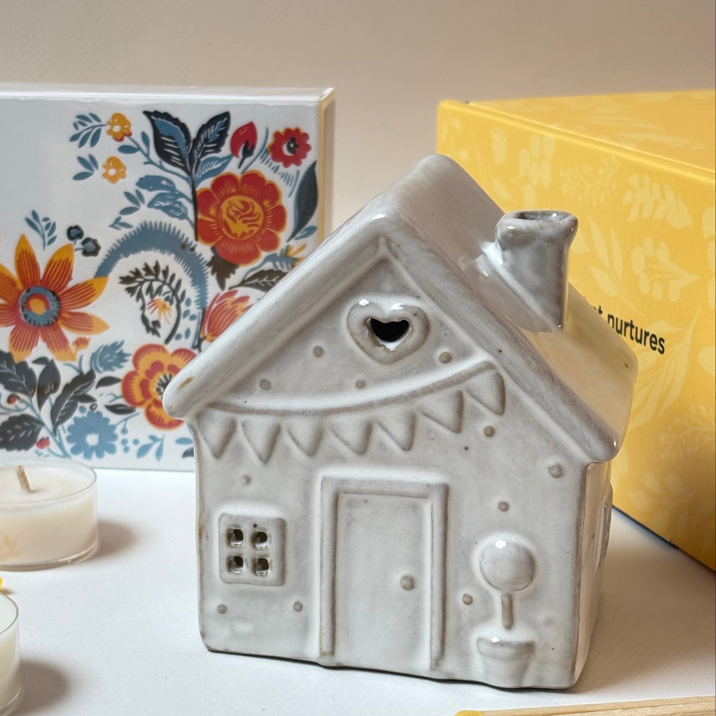 Ceramic house-shaped candle holder 
