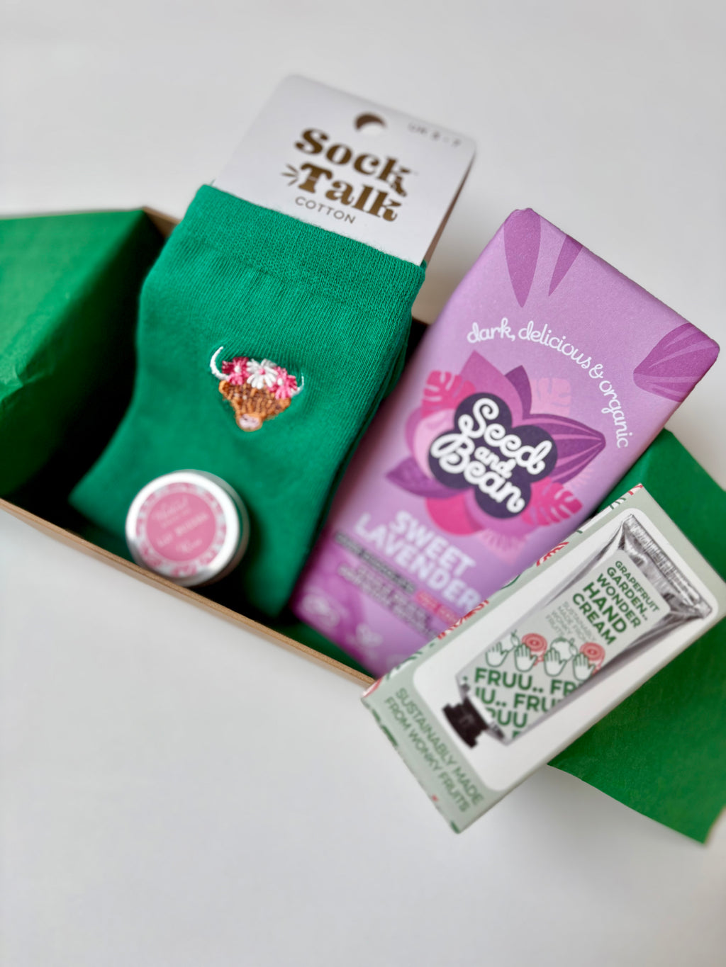 Little Luxuries self care gift box cotton socks, vegan chocolate natural lip butter, organic hand cream 
