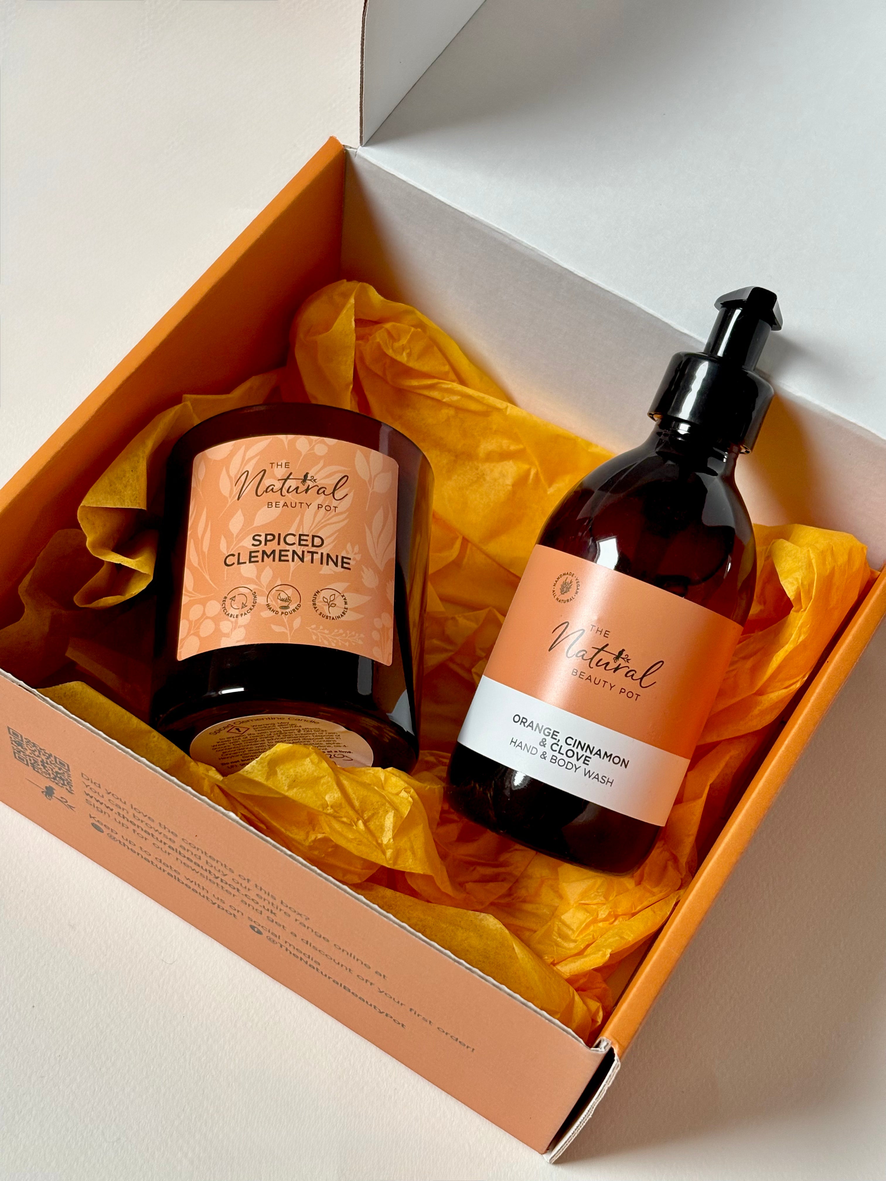 Orange, Cinnamon and Clove candle and hands was gift set by The Natural Beauty Pot 