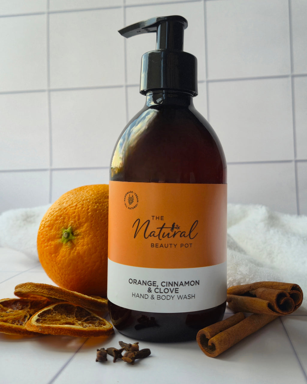 Natural sulphate free Hand and body wash bottle with orange, cinnamon, and clove