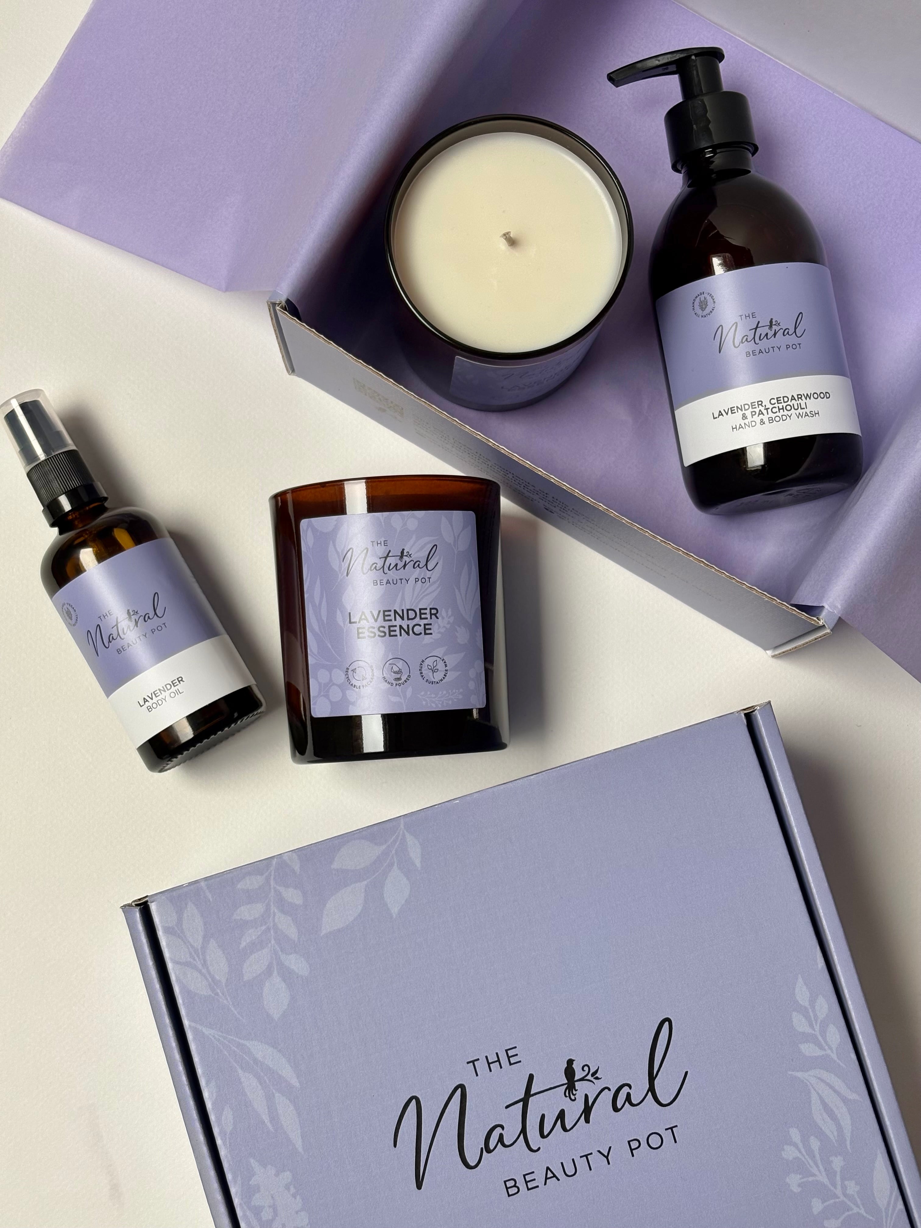 lavender lovers natural personal care gift body wash, candle and body oil in a lilac gift box 