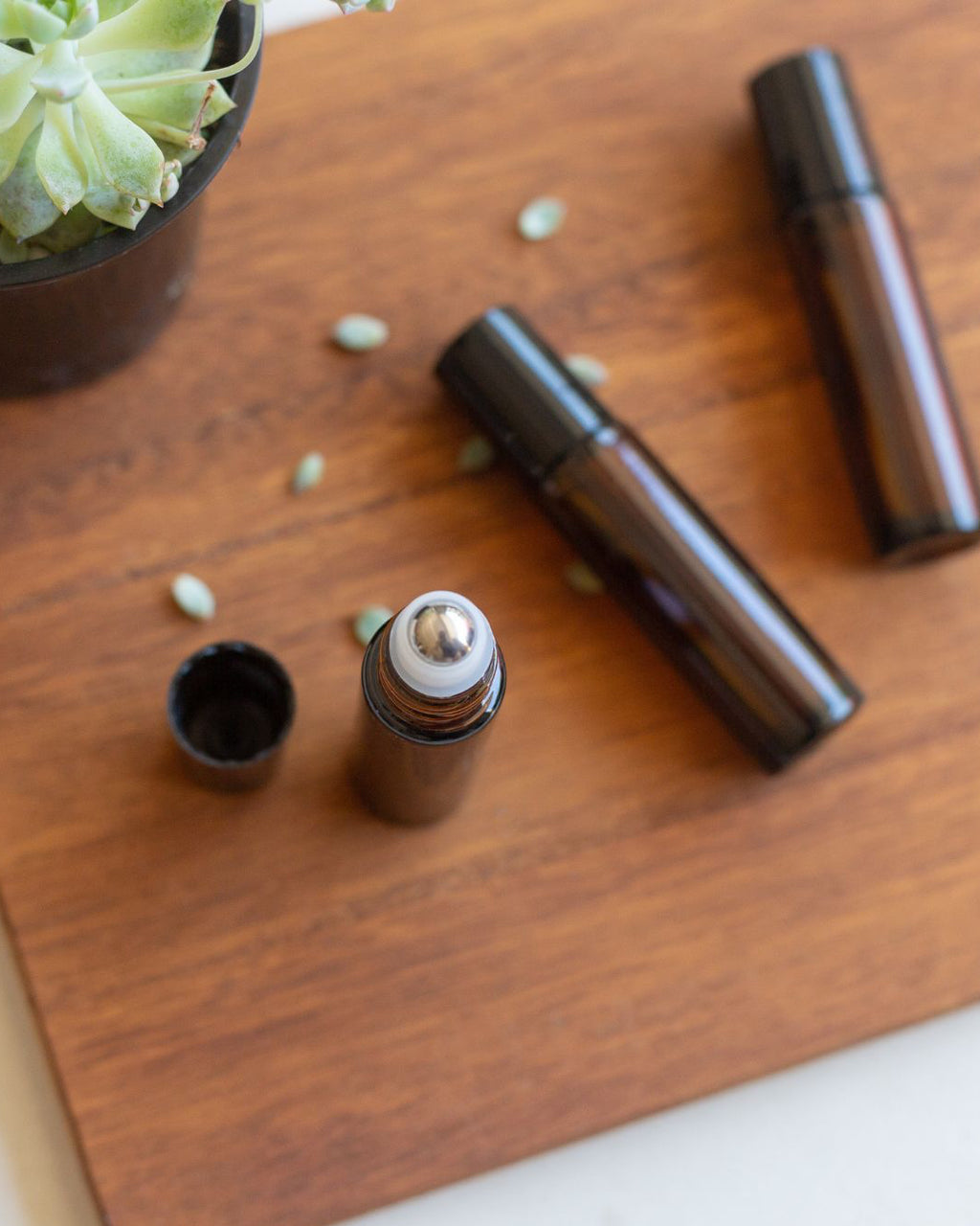 make your own roller bottles owith aromatherapy essential oils