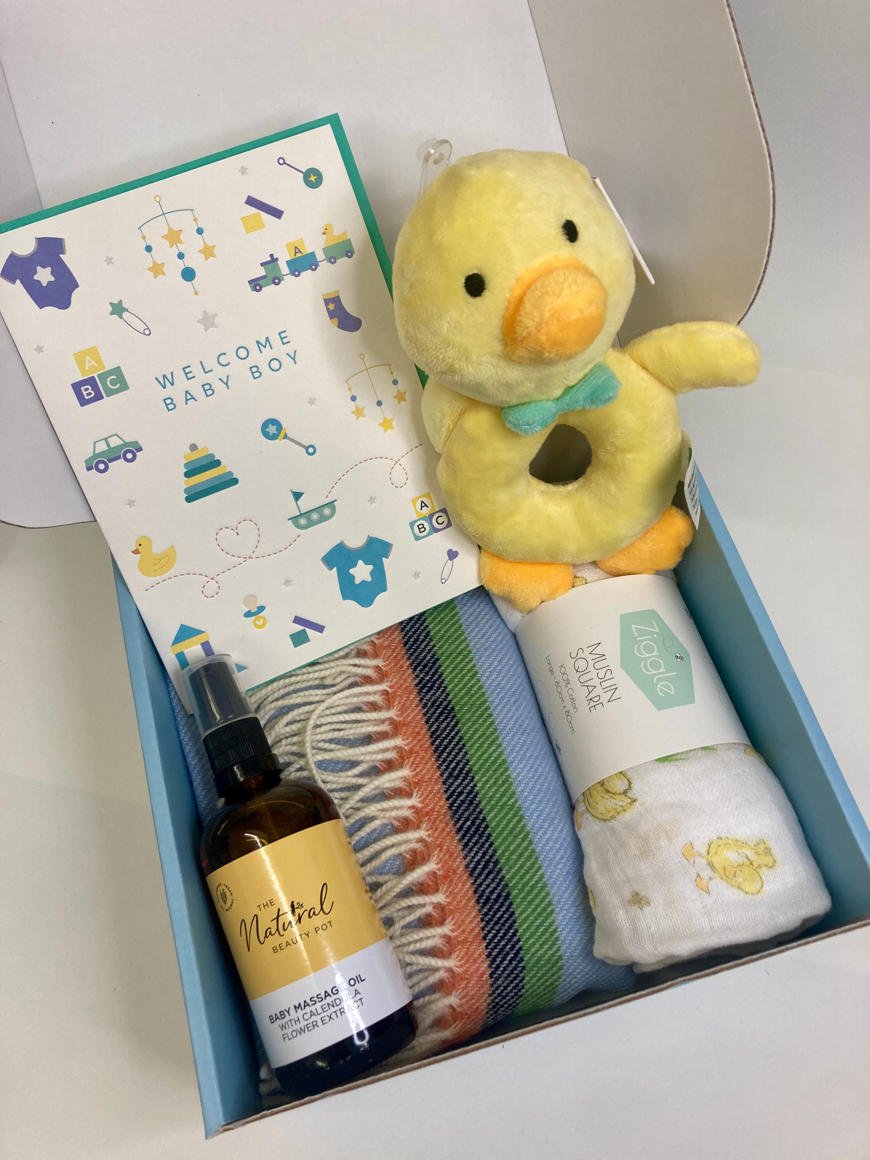the_Natural_Beauty_Pot_Luxury_new_baby_boy_gift_Mcnutt_of_donegal_baby_blanket_natural_and_organic_baby_massage_oil_large_cotton_muslin_plush_duck_rattle_letterpressed_card