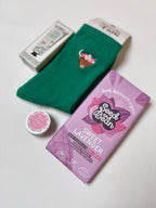 thoughtful self care gift highland cow socks, grapefruit hand cream, sweet lavender vegan chocolate, natural organic lip butter