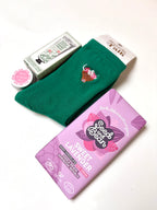 thoughtful self care gift highland cow socks, grapefruit hand cream, sweet lavender vegan chocolate, organic lip butter